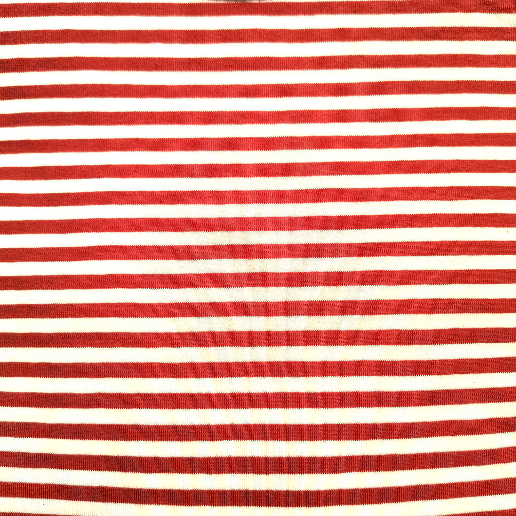 Maglietta lunga e svasata in jersey di cotone a righe